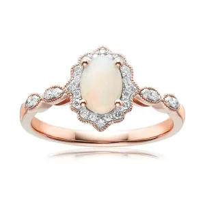 9ct Rose Gold Oval Cut 7x5mm Opal & 0.15 Carat tw of Diamonds Ring
